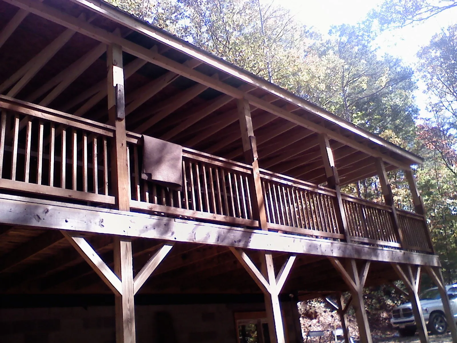Timber framing under a new elevated porch and deck — Roof Leak Repair in Staley by Roofing Brothers